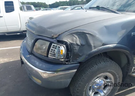 1999 Ford F150 z USA, uszkodzony, nr VIN 1FTRX18W4XNA64993